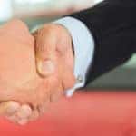 Two men handshaking