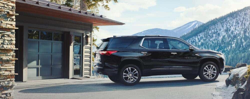 2021 Chevrolet Traverse parked near a home