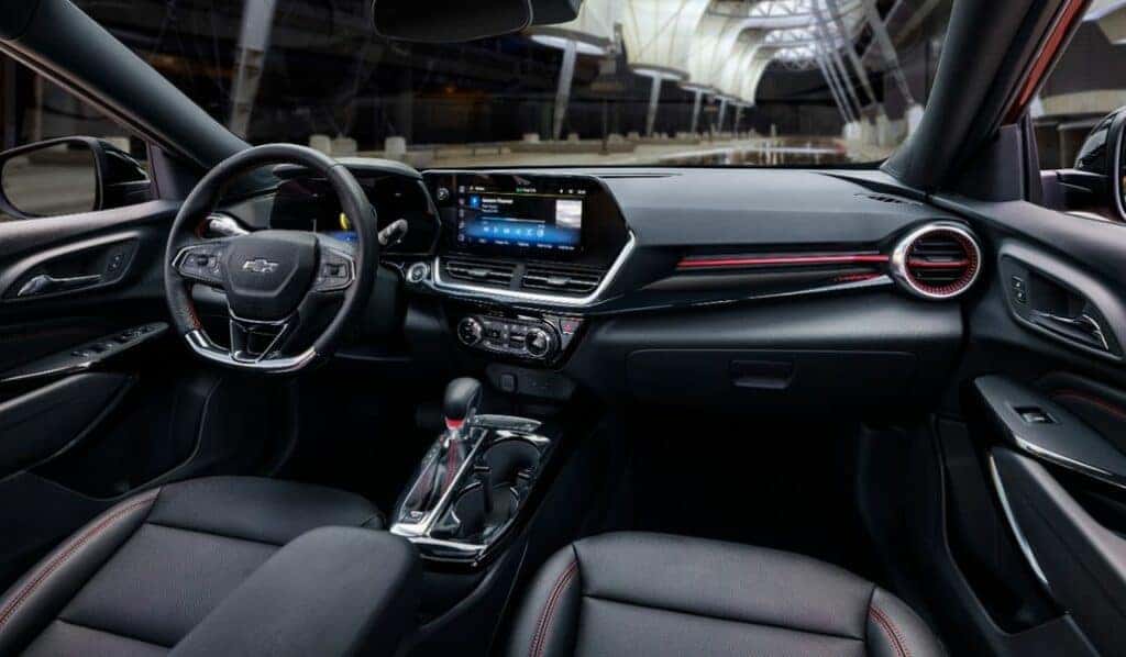 View of front cabin in Chevrolet Trax RS with Jet Black with Red Accents Interior. Pre-production model shown. Actual production model may vary. Available in spring 2023.