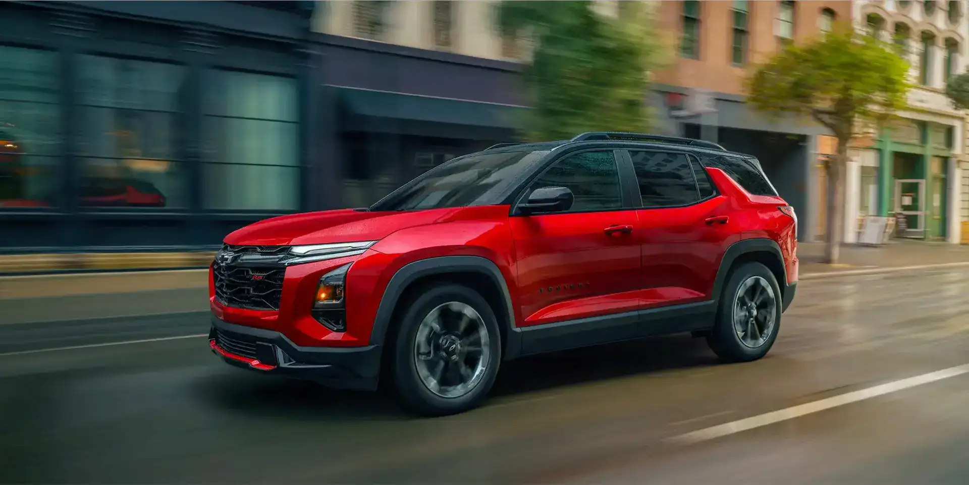 2026 Chevrolet Equinox RS Radiant Red Tintcoat in motion