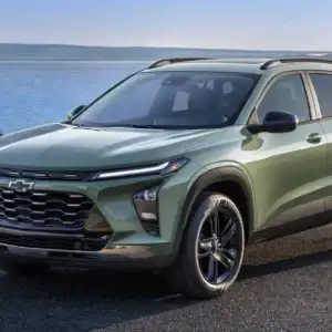 2026 Chevrolet Trax Cacti Green next to a lake