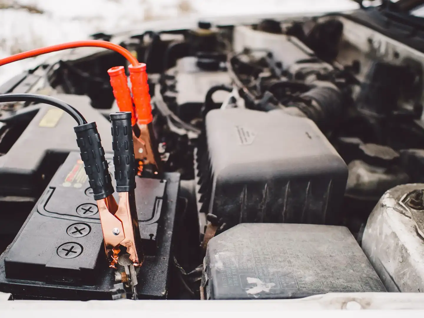 Chevrolet battery and jumper cables