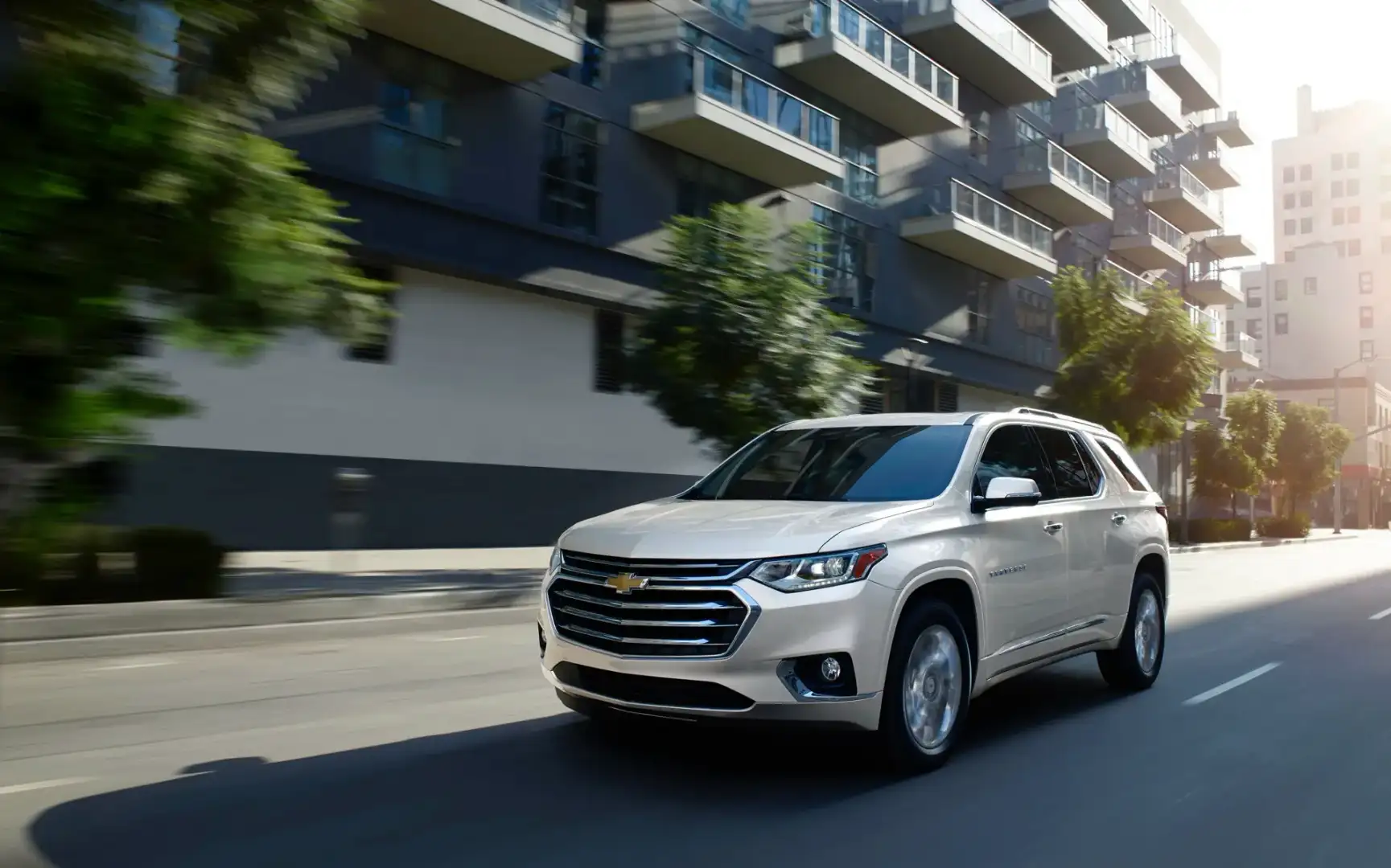 Chevrolet Traverse driving on a city street