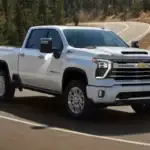 Chevrolet Silverado 2500 HD driving on a winding road