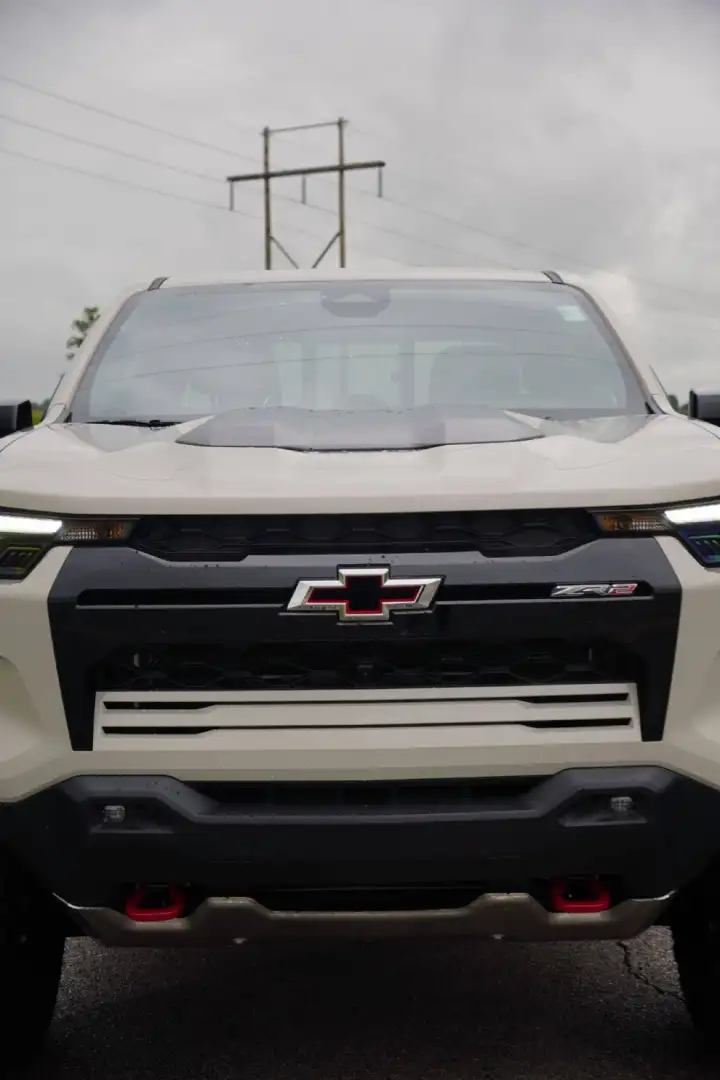 Front close-up view of a tan Chevrolet Colorado ZR2 off-road truck at Barry's Chevrolet in West Union, OH