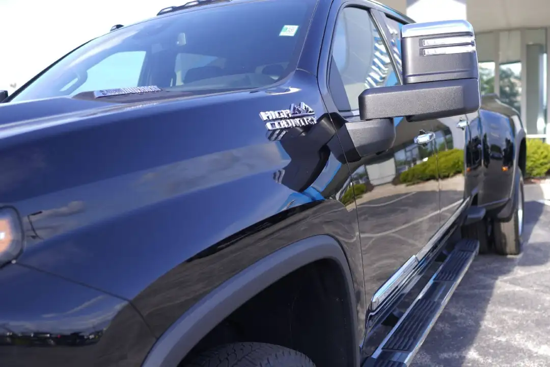 Side view of a black Chevrolet Silverado High Country truck at Barry's Chevrolet in West Union, OH