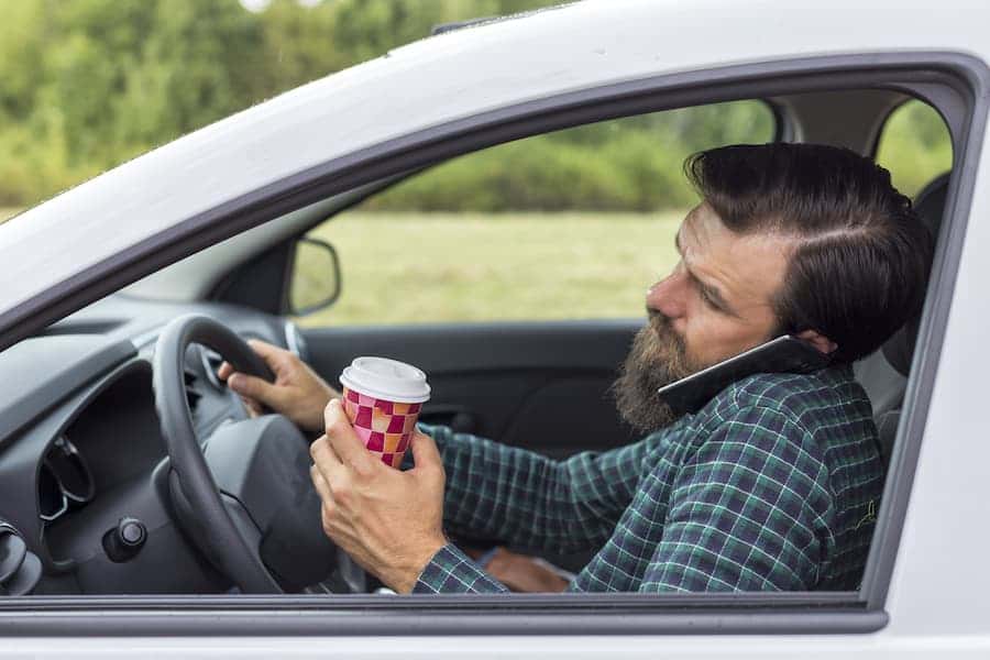 How to recognize a distracted driver.