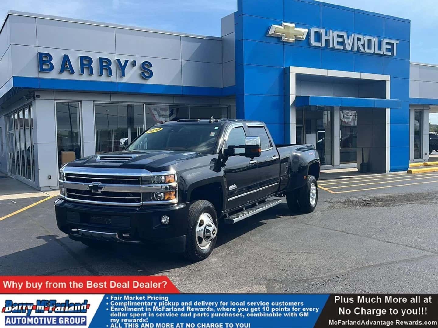 An Affordable Chevy Pickup Truck Outside The Professional Barry's Chevrolet Store