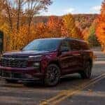2026 Chevrolet Traverse on a winding Adams County Ohio two-lane road surrounded by fall foliage