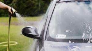 person washing a car