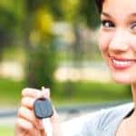 girl showing the car key