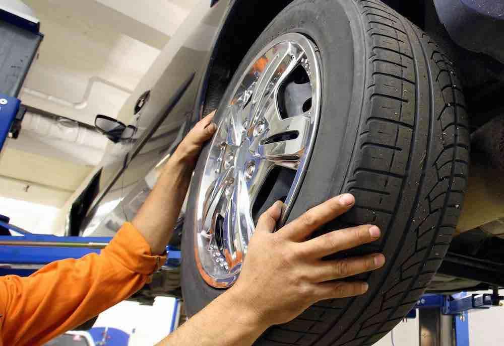 mechanic changing a car wheel