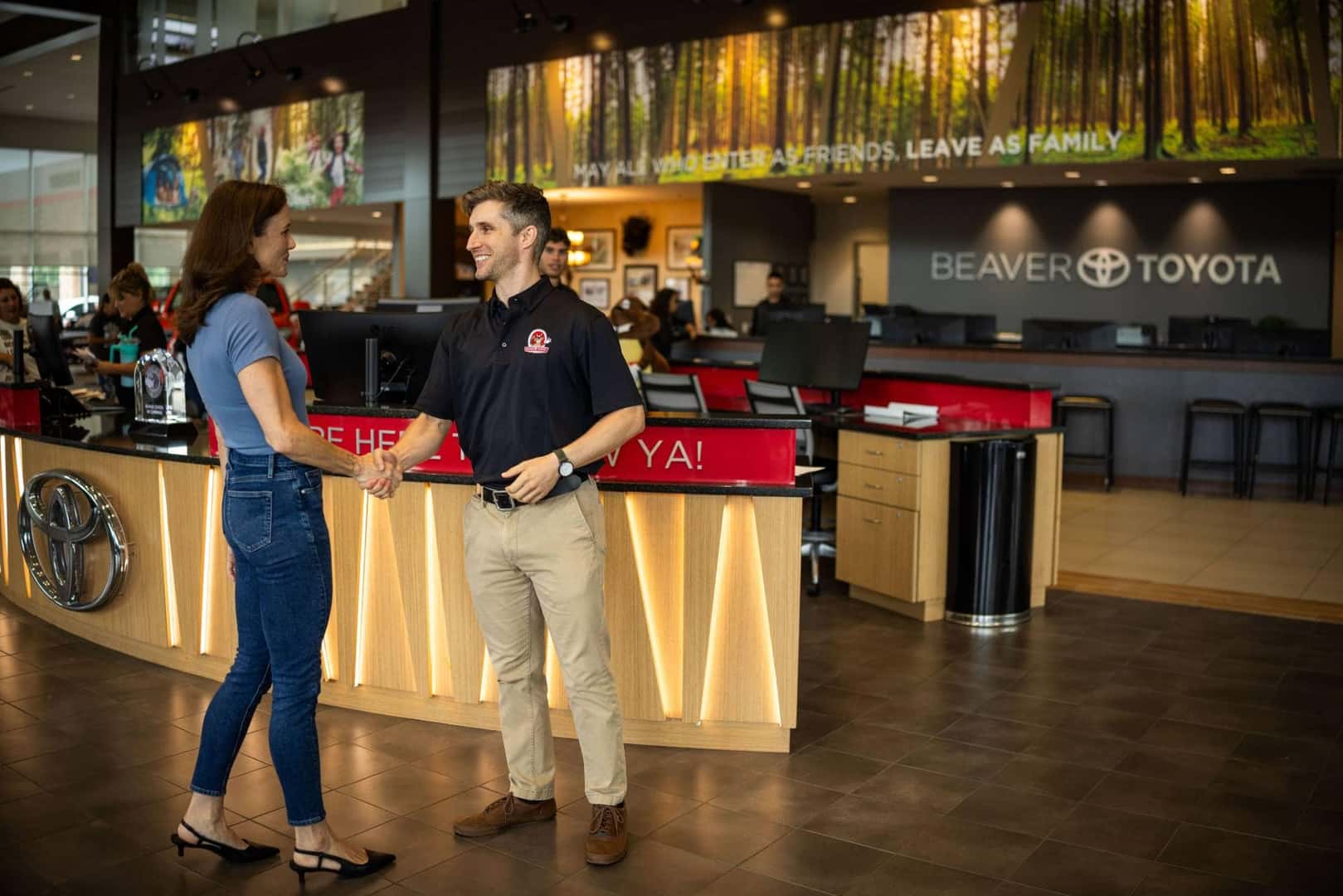 Beaver Toyota Employee shaking hand to customer
