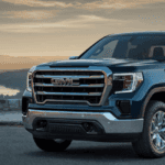 2020 GMC Sierra 1500 parked with sun setting in the distance