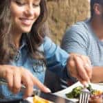 Couple having lunch at rustic gourmet restaurant
