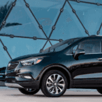 2020 buick encore with woman walking near geodesic dome