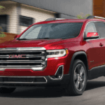 2020 GMC Acadia driving on highway