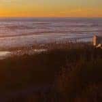 RV campers parked along the beach at sunset in southern California