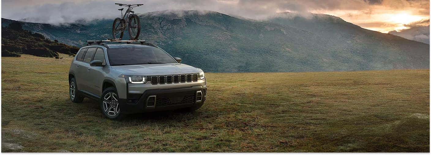 Gray 2026 Jeep Cherokee Parked In Mountainous Terrain