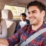 family in car
