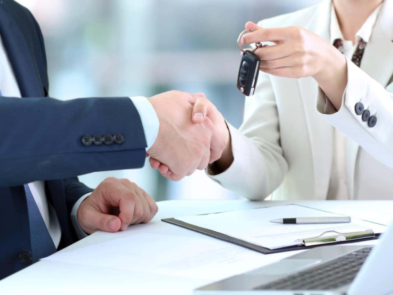 Person financing a Ram 1500 with keys