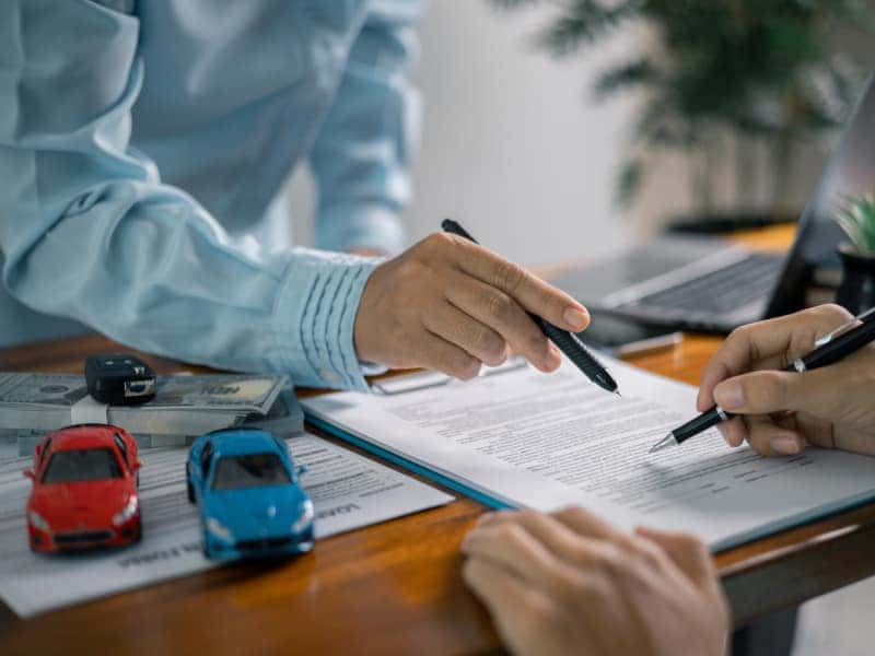 Gunn Buick GMC finance specialist working with a customer