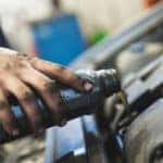 Man changing oil