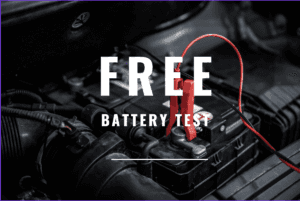 The background is a photograph of a vehicle battery. There is a red charge cord attached to it. On top of the image it says "FREE battery test" in white lettering. 