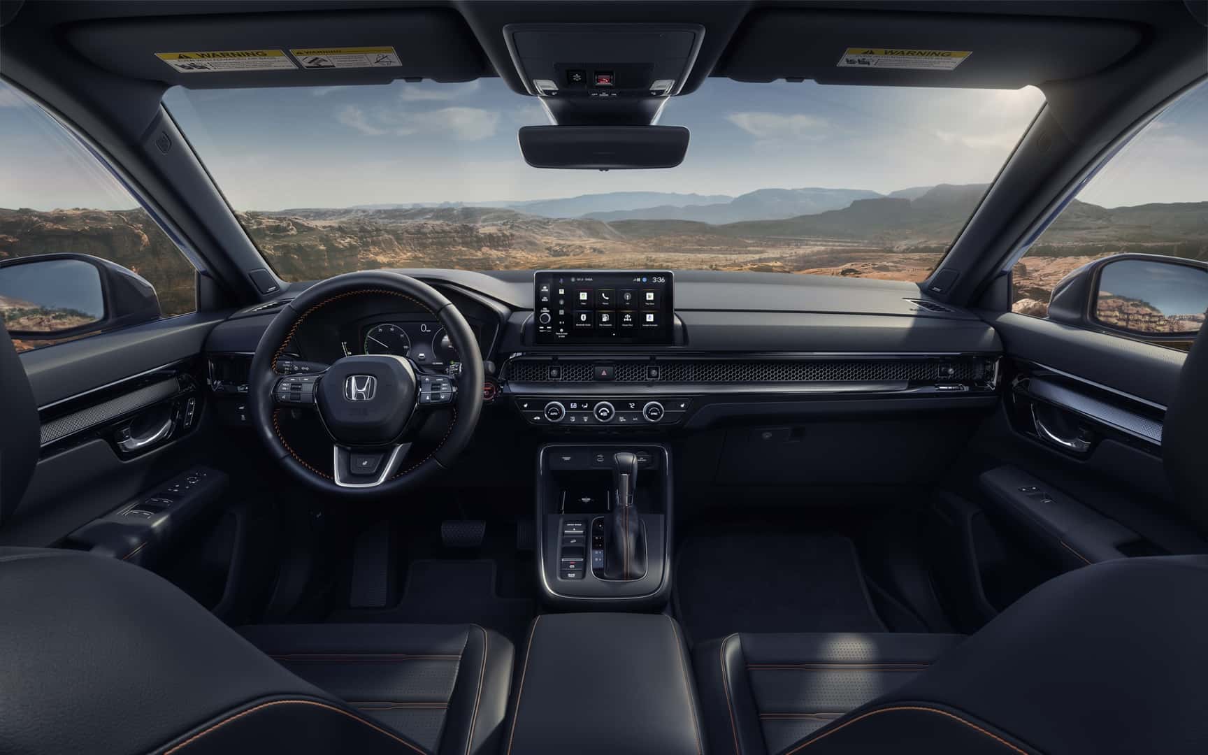 Honda CR-V cabin showing dashboard, center console and front seats