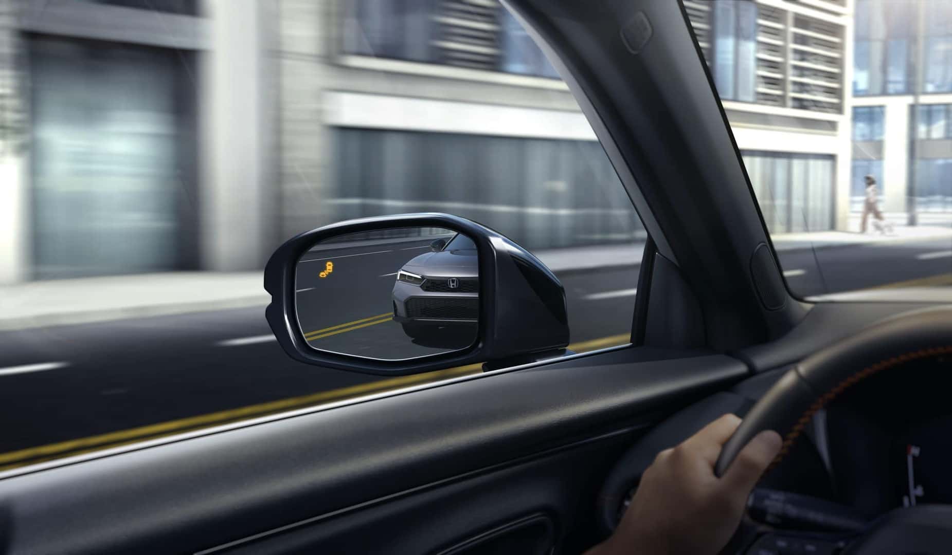 Honda HR-V Sport side mirror displaying the blind-spot information indicator