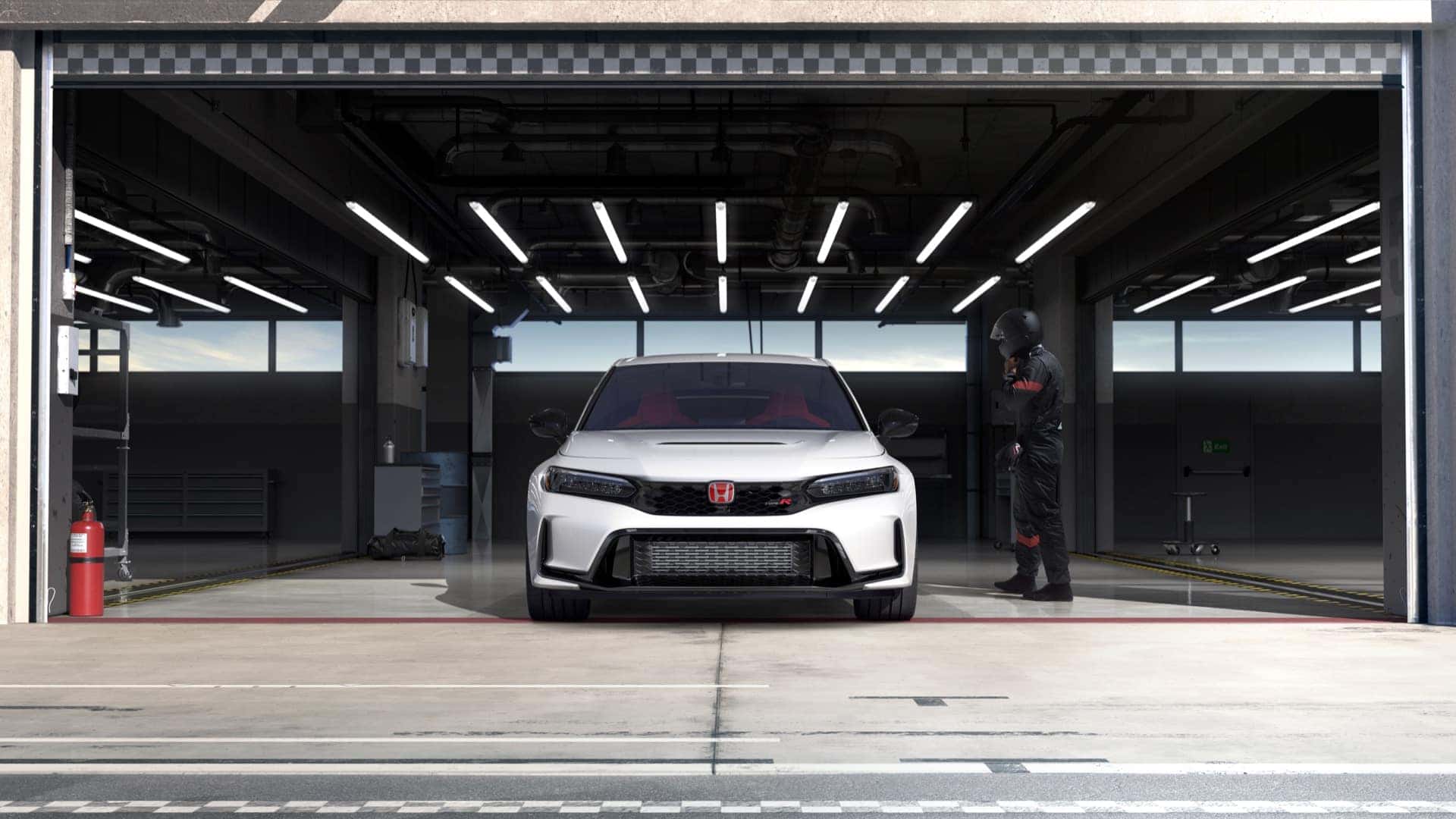 White 2027 Honda Civic Type R facing forward inside a garage