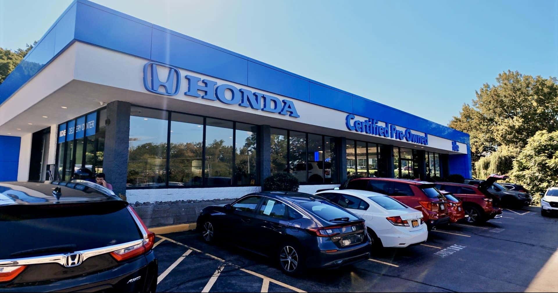 Ide Honda Certified Pre-Owned building with vehicles parked outside
