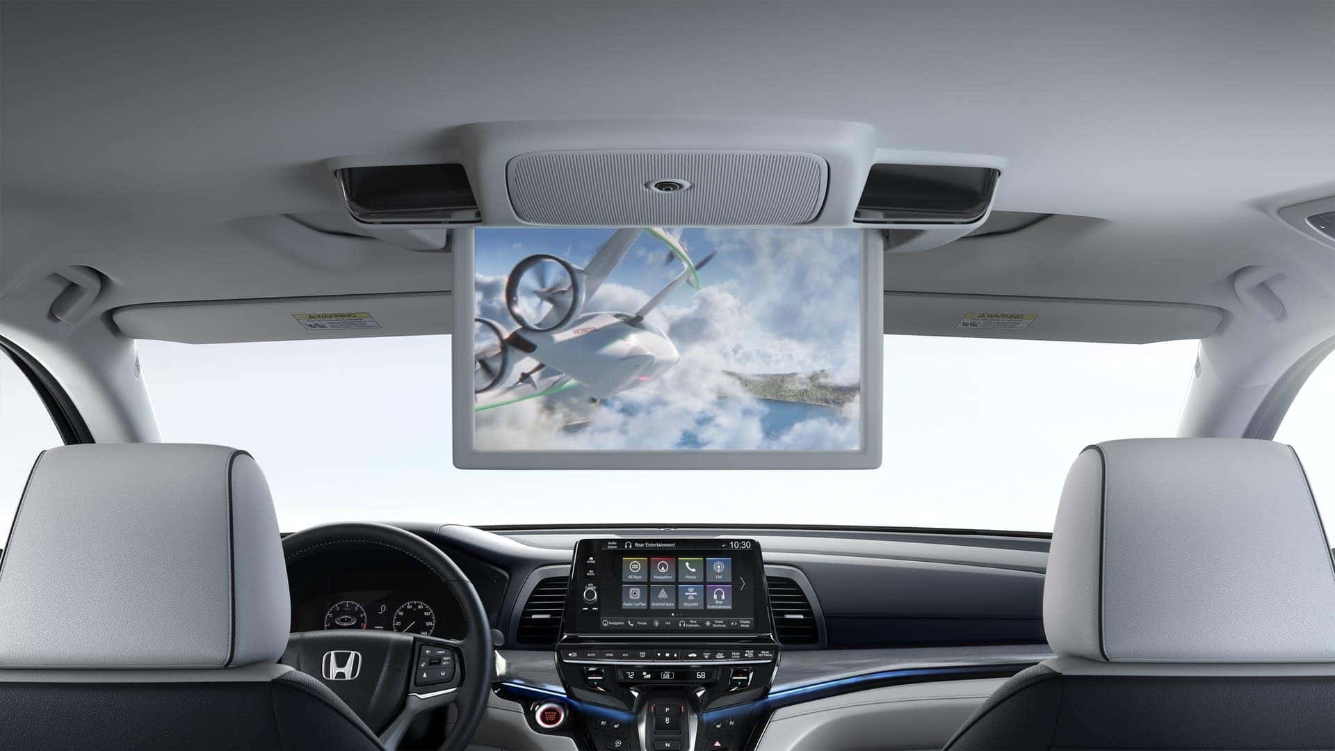 Honda Odyssey overhead rear entertainment screen viewed between the front seats