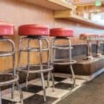 Restaurant diner with interior stools
