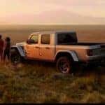 Two Campers Outside with 2020 Jeep Gladiator Parked Beside Them