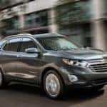 2019 Chevrolet Equinox Black Driving down street