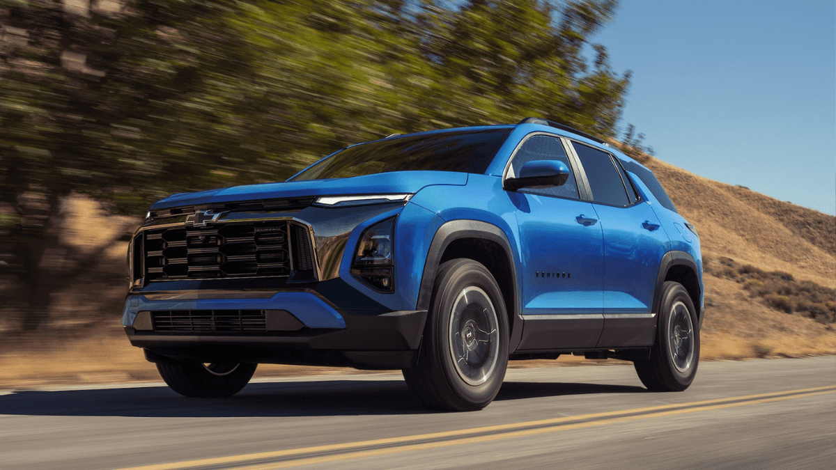 A front, low-angle view of a blue Chevrolet Equinox