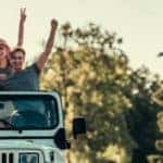 friends having fun in jeep