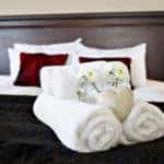 Hotel room with bed and towels on it