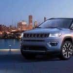 Jeep Compass Parked at home with city in the background