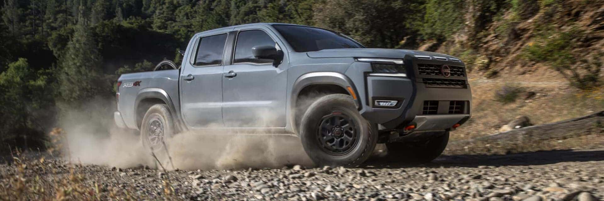 2026 nissan frontier on dusty road