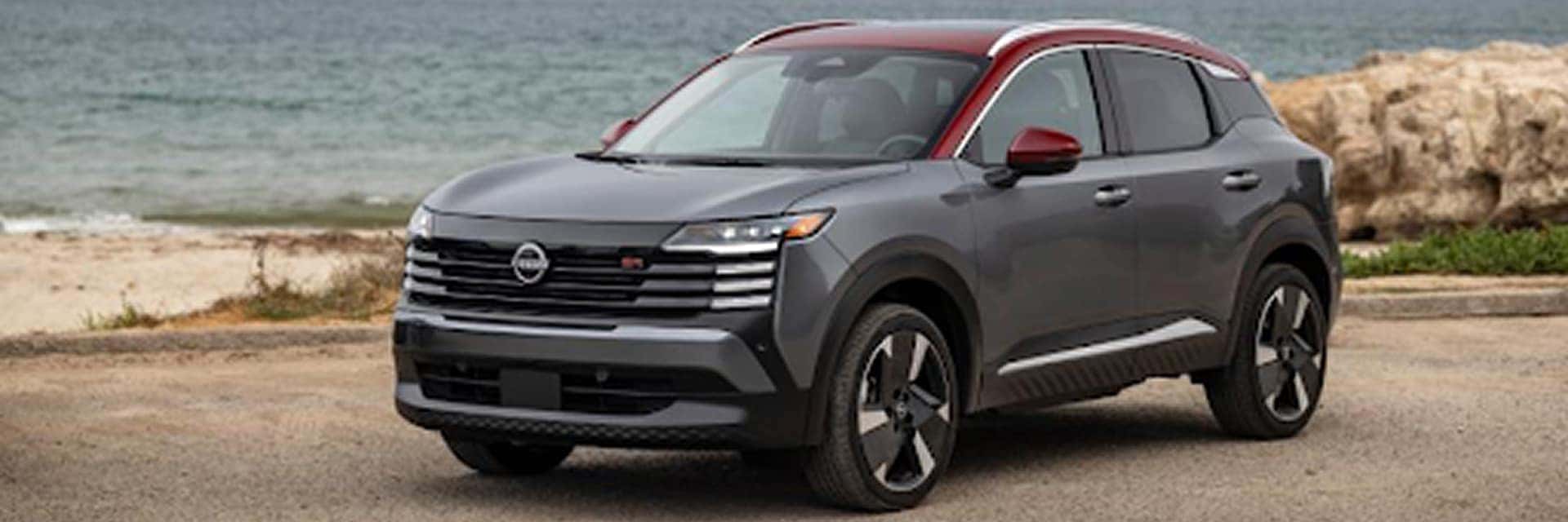 2026 nissan kicks parked in front of water