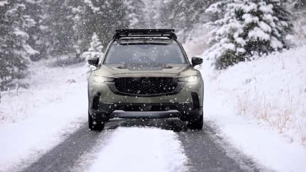 Mazda CX-50 driving through snowy Colorado winter conditions