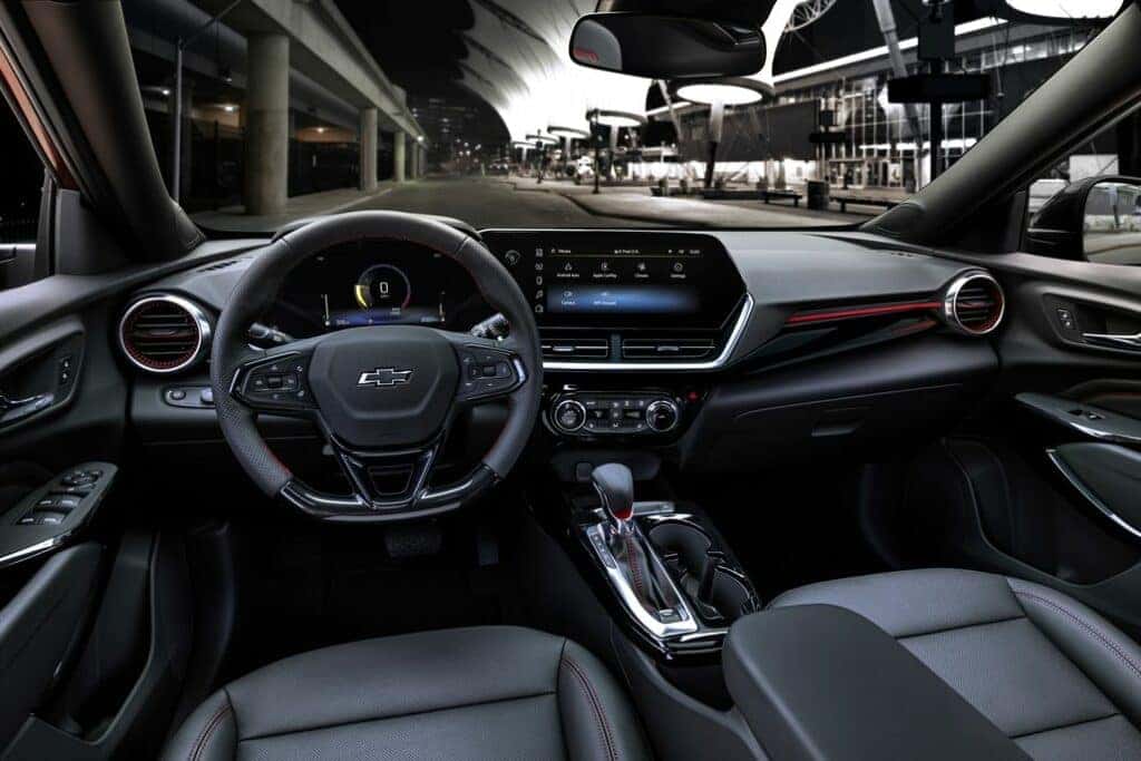 View of front cabin in Chevrolet Trax RS with Jet Black with Red Accents Interior. Pre-production model shown. Actual production model may vary. Available in spring 2023.
