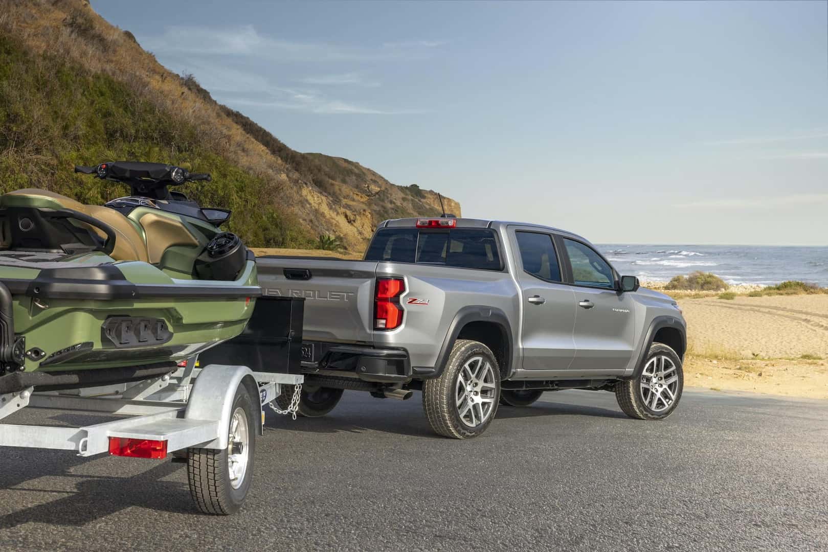 Rear 3/4 view of Colorado Z71 towing a personal watercraft.