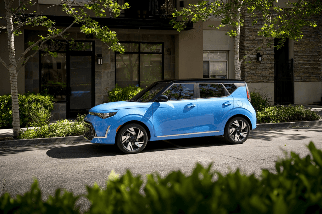 Kia Soul Parked Side View on a Downtown Curb