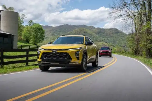 Yellow Chevrolet Trax driving on the road