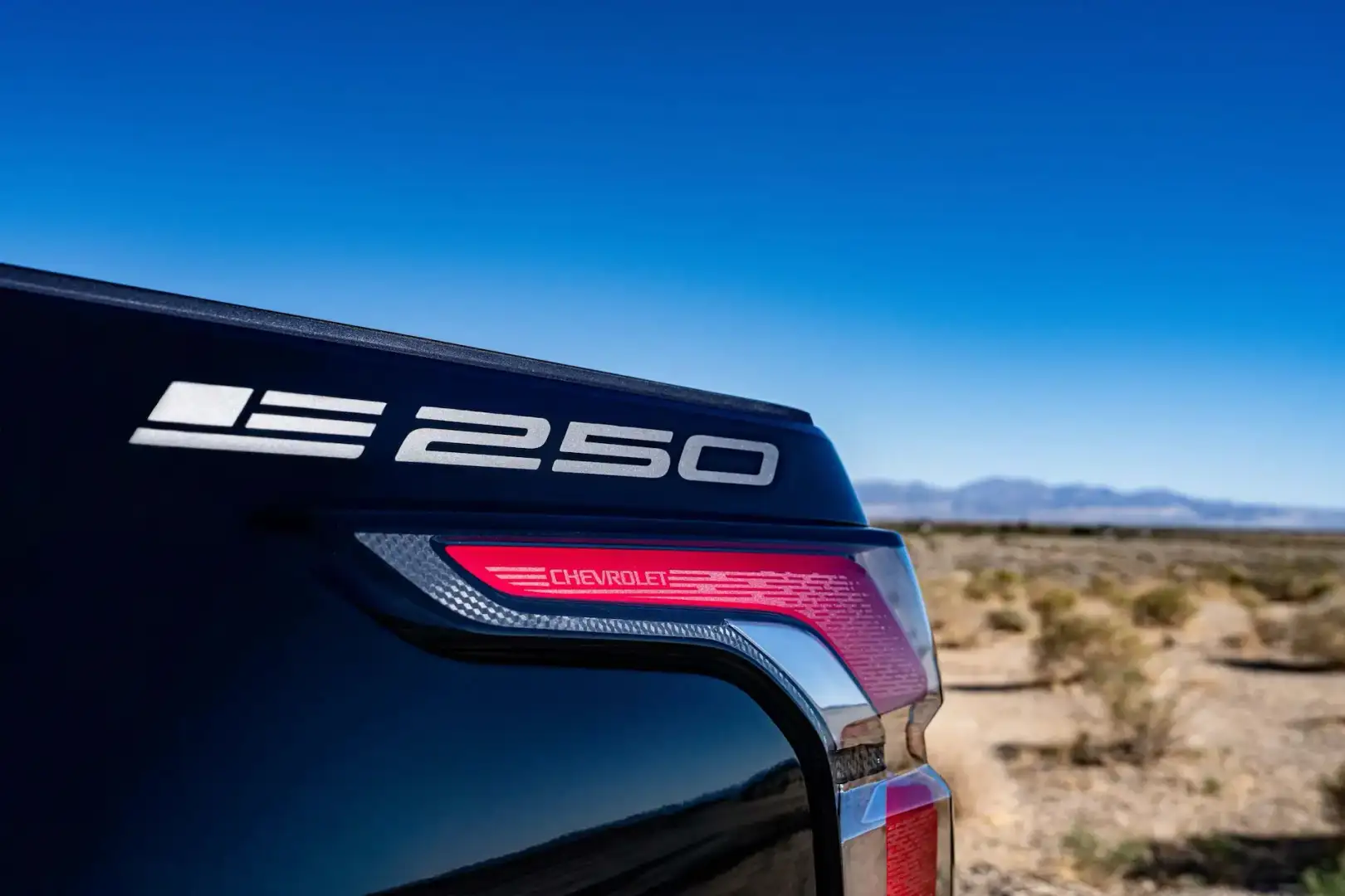 Chevy Stars and Steel on a Black Silverado EV rear side view
