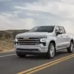 Chevrolet Silverado 1500 High Country driving on a desert road