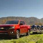 The Quality 2018 Chevrolet Colorado Diesel Towing Multiple Vehicles, In A Green Valley